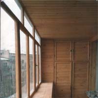 Остекление балкона деревянными рамами